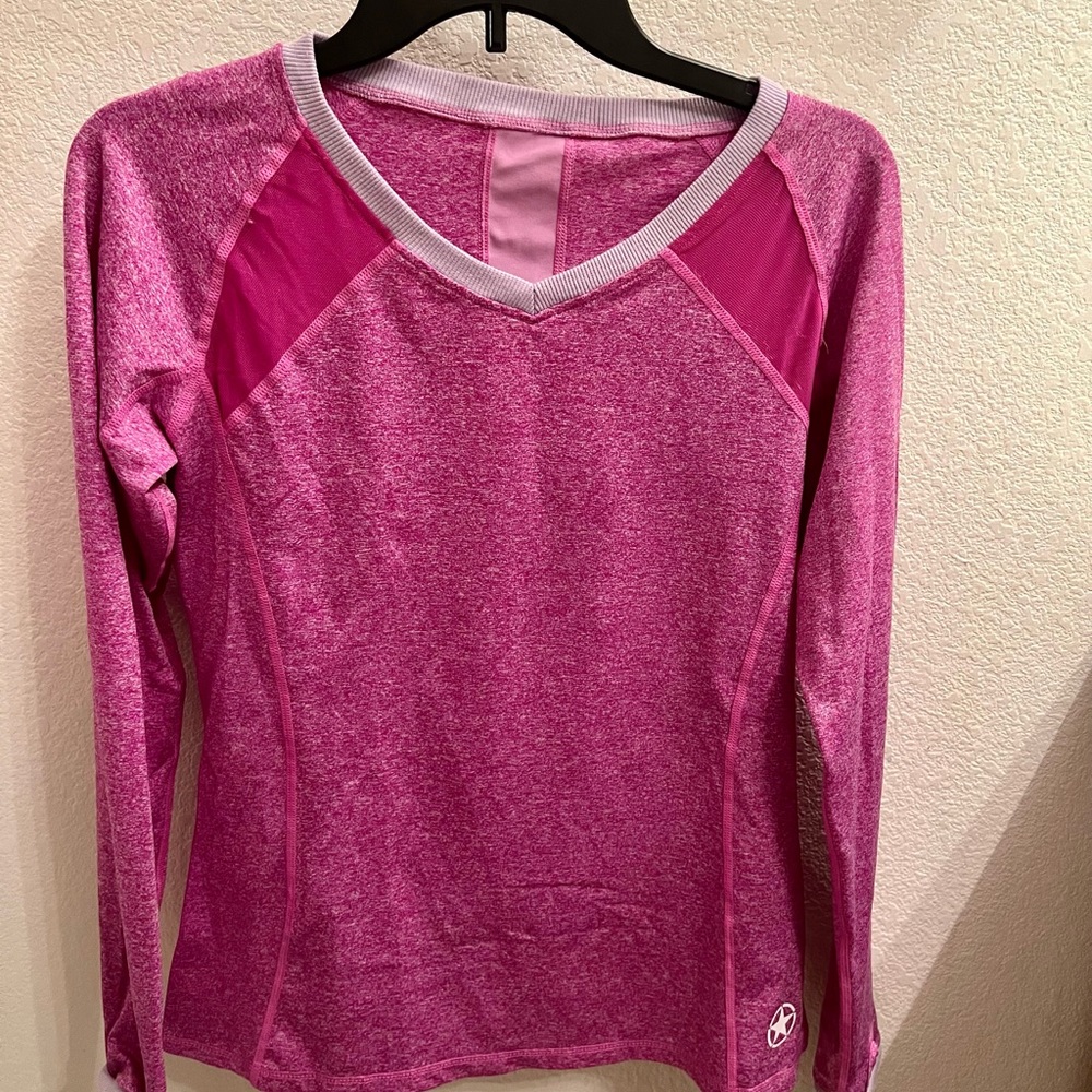 Savage Long Sleeve with thumb holes and zippers.